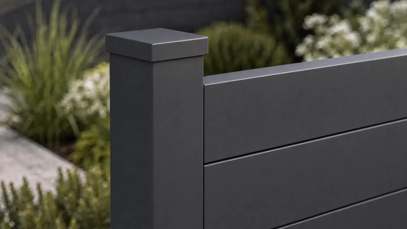 Close up of an aluminium fence post and boards