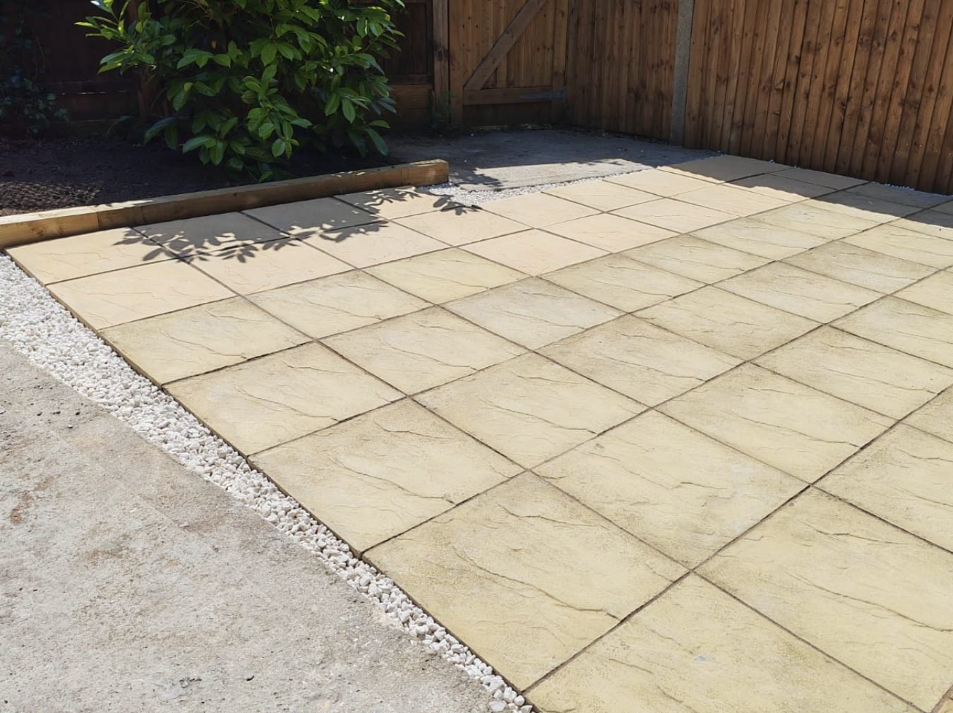 A finished surface with a gravel margin run along the edge